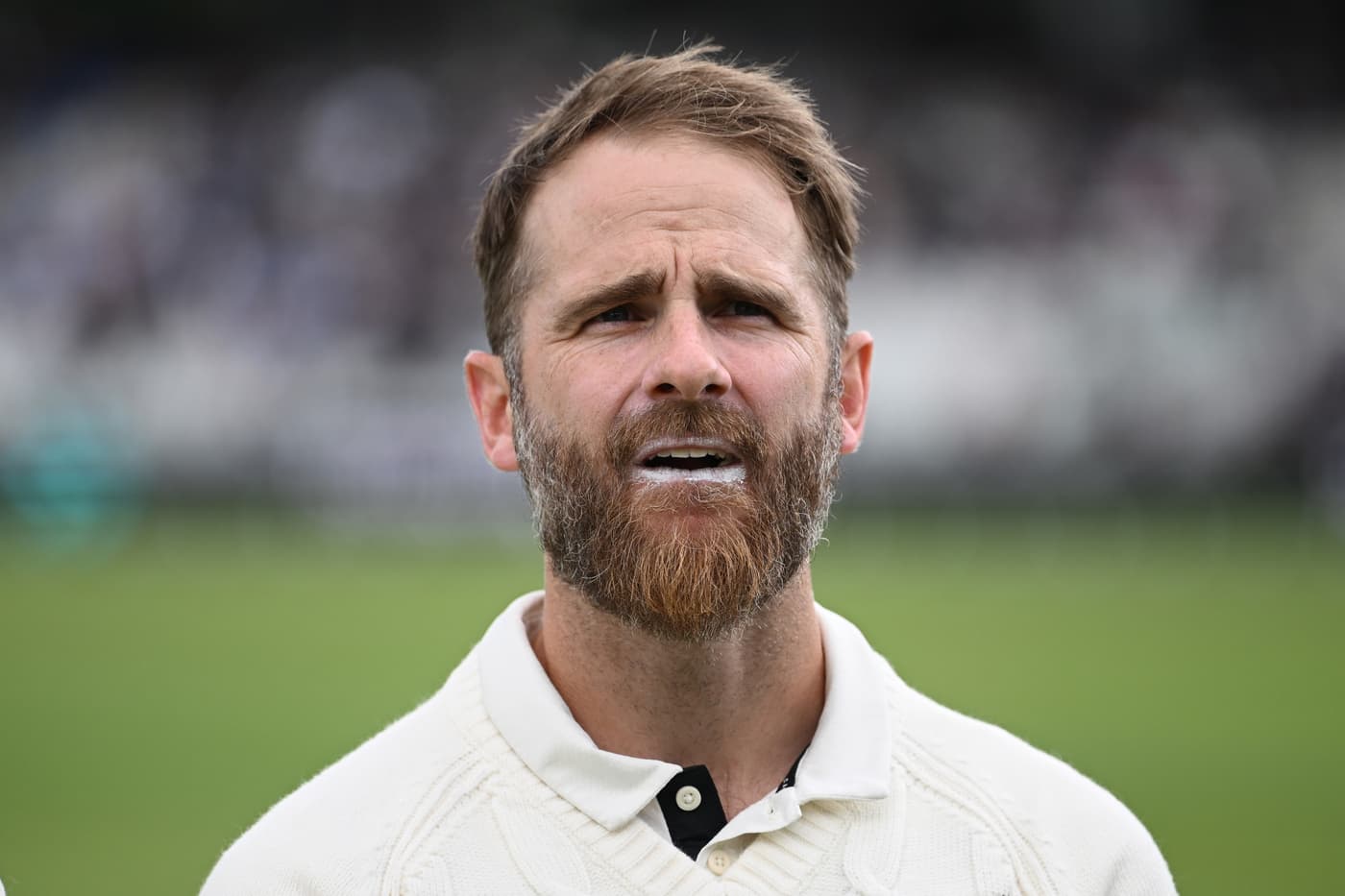 Kane Williamson during a match, symbolizing his impact on New Zealand cricket.