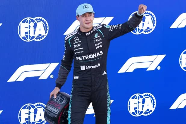 George Russell celebrating his pole position at the Barcelona-Catalunya Grand Prix, showcasing his lap time and the Mercedes team logo.