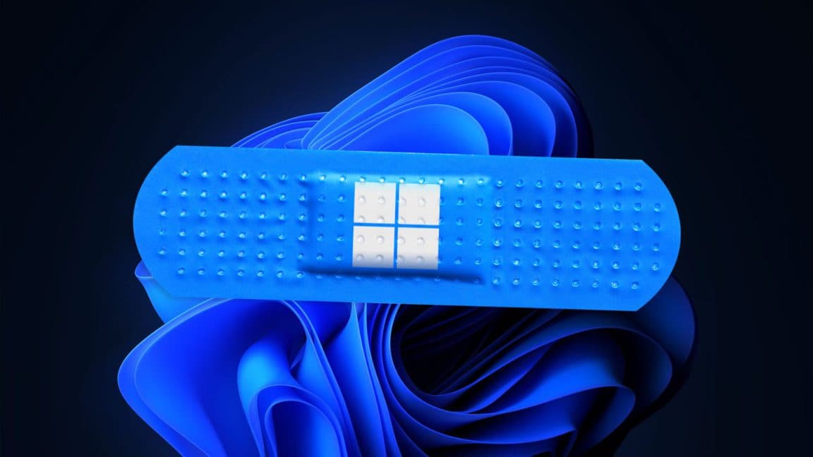 Microsoft logo with a visual representation of driver rollback feature in Windows Update