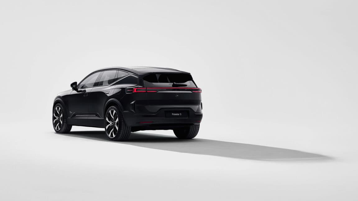 Polestar electric vehicle with a backdrop of U.S. regulatory symbols