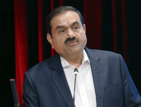Gautam Adani speaking at a business conference