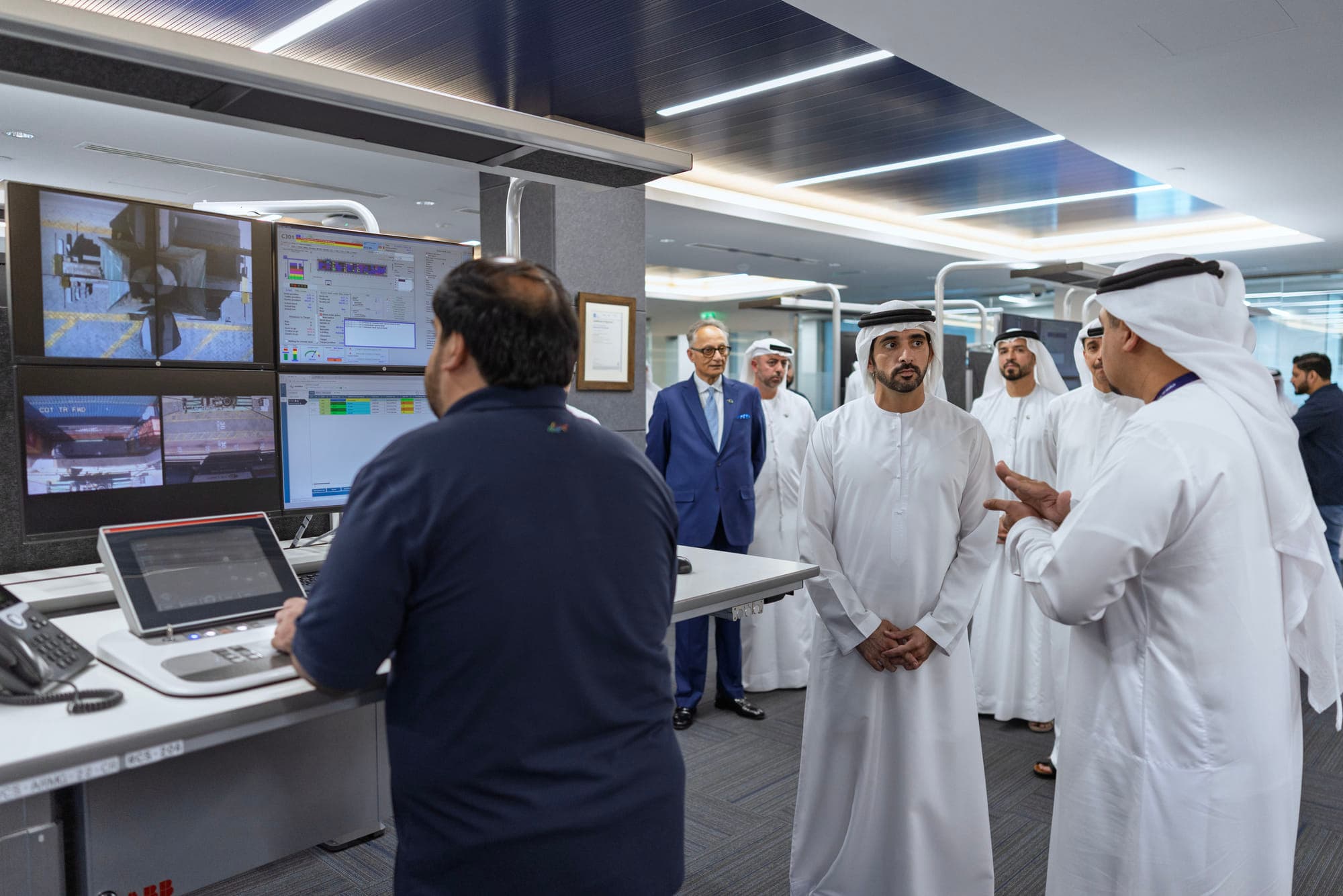 Sheikh Hamdan bin Mohammed at Jebel Ali Port reviewing operations.