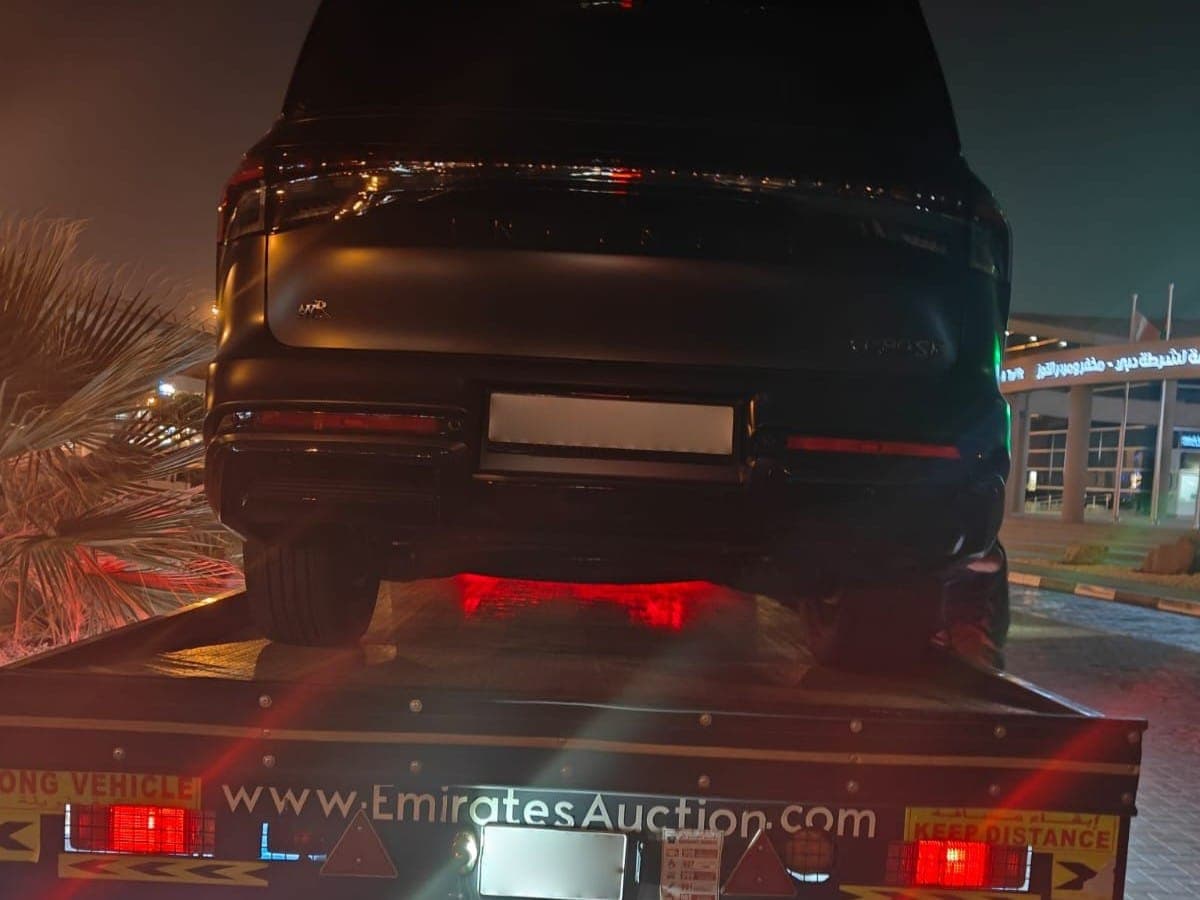 Dubai Police vehicle on the road enforcing traffic laws