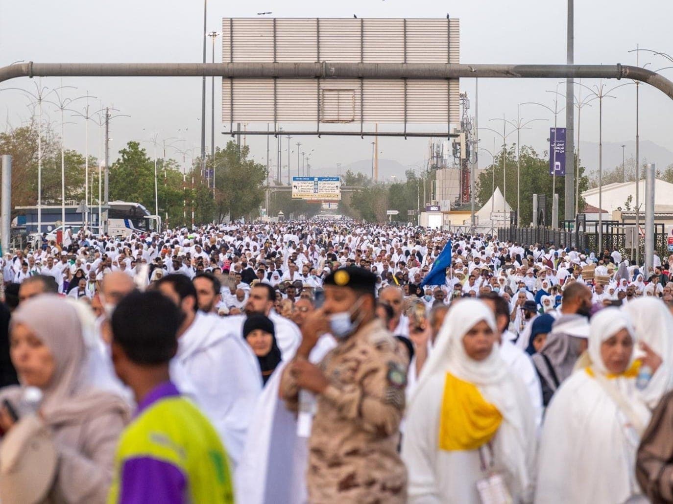Pilgrims at Arafat during Hajj under extreme heat conditions.