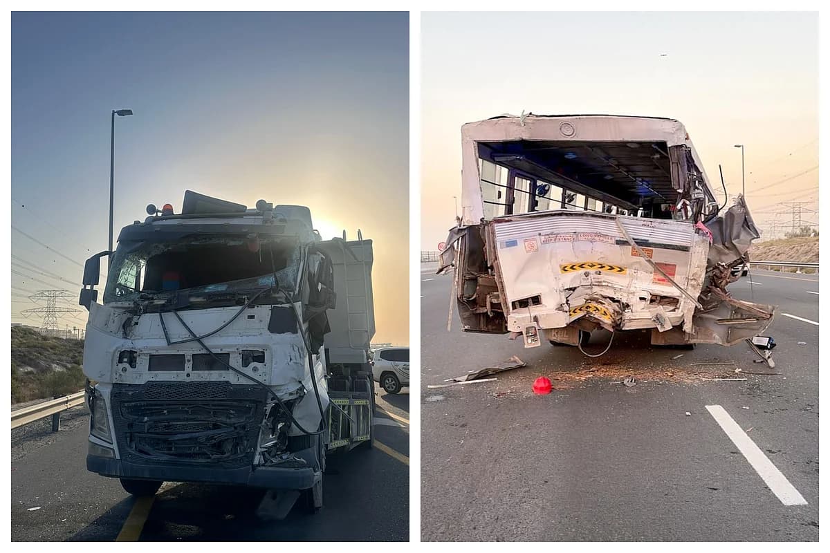 Emergency responders at the scene of a truck-bus collision in Dubai.