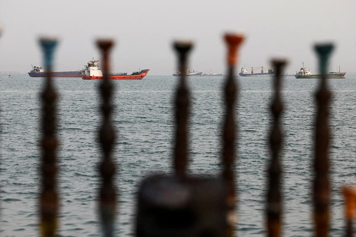 Iran and US flags symbolizing diplomatic negotiations and tensions.