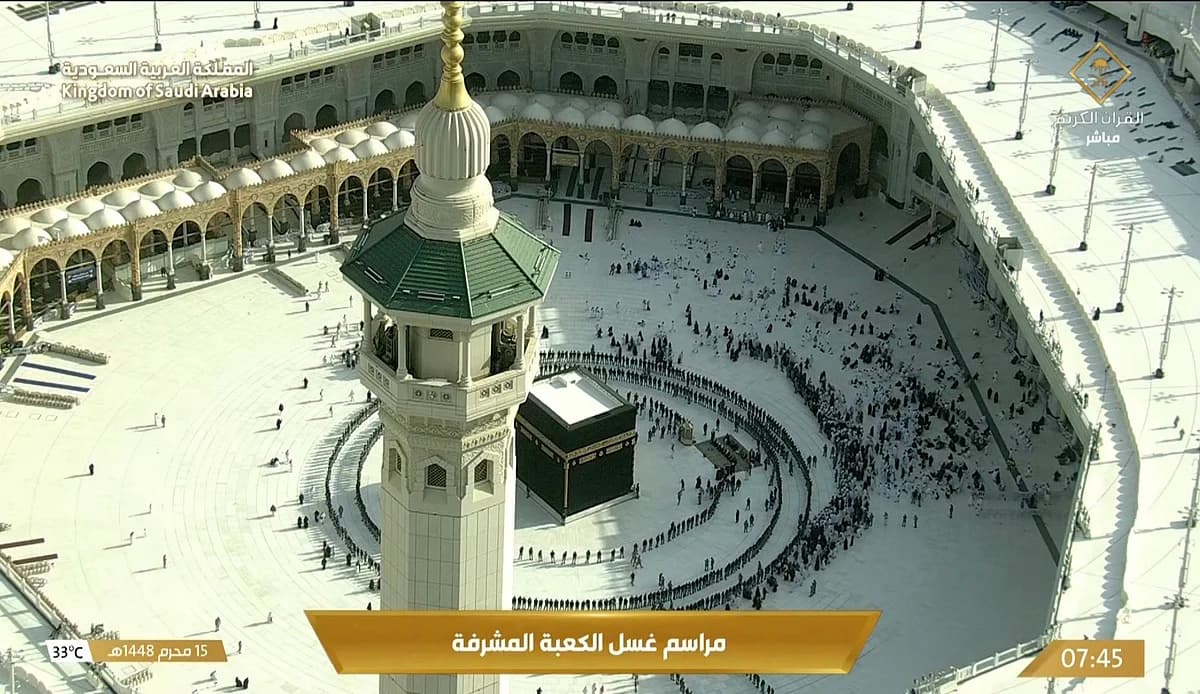 The Holy Kaaba during its ceremonial washing, showcasing the ritual's significance.