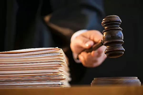 A courtroom setting symbolizing justice against human trafficking in Abu Dhabi.