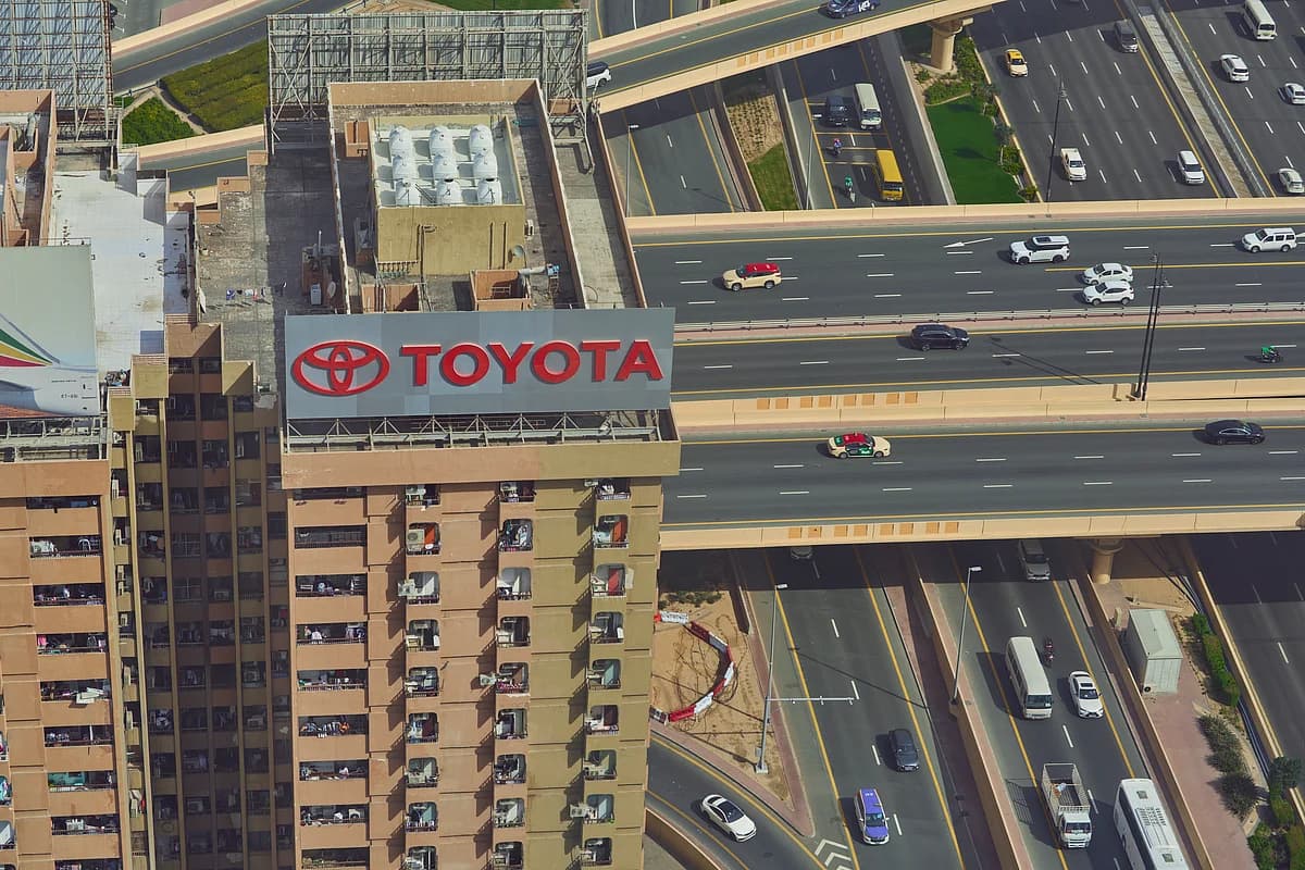 The iconic Toyota sign atop the Nasser Rashid Lootah Building, symbolizing Dubai's blend of heritage and modernity.