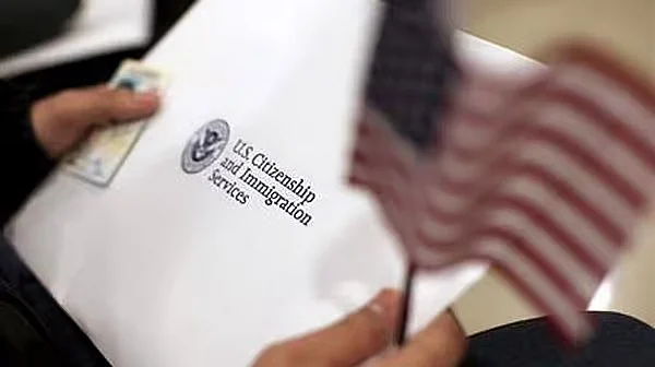 Infographic showing the timeline of U.S. immigrant visa appointment pauses and revoked visas.