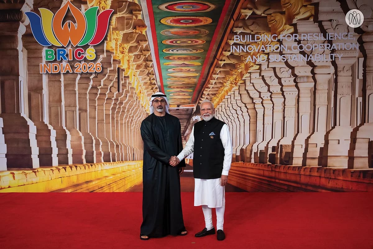 Sheikh Khaled at the BRICS Summit discussing trade cooperation with global leaders.