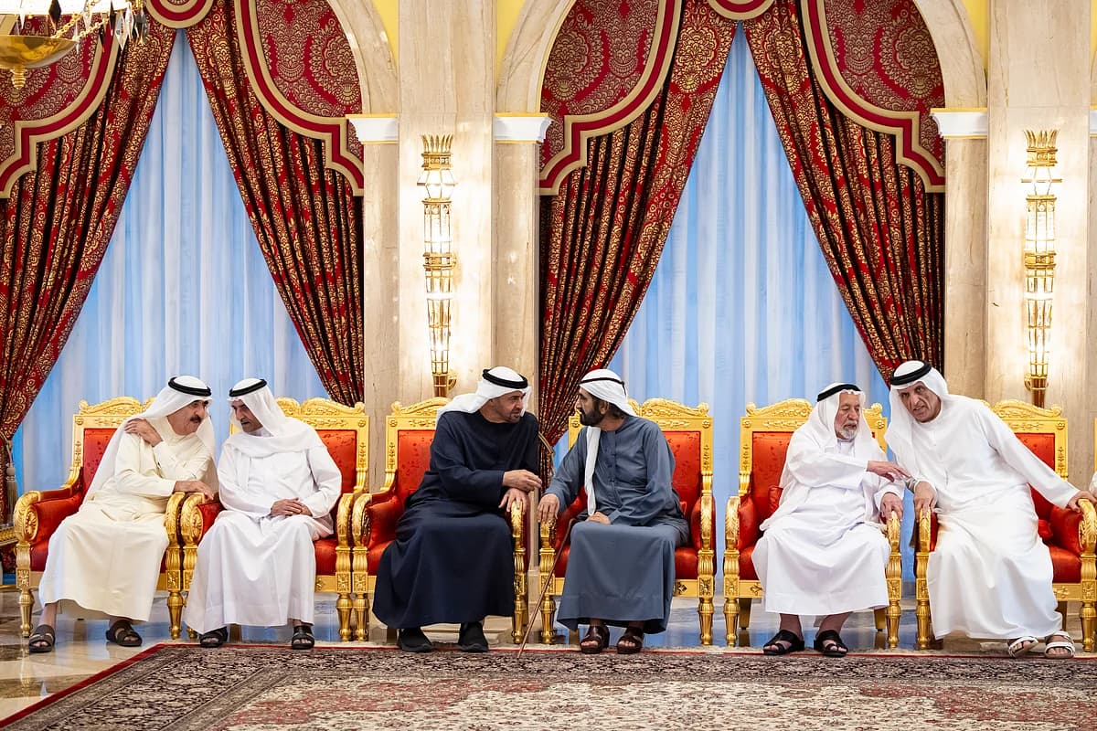 Sheikh Ahmed bin Rashid Al Maktoum with Dubai skyline in the background, reflecting on his leadership legacy.