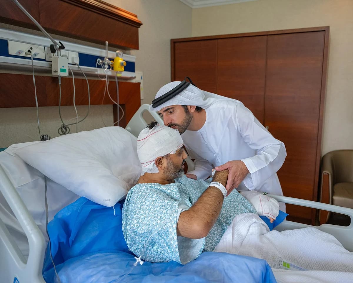 Sheikh Hamdan visiting injured flydubai pilot Smit Machchhar in hospital, emphasizing aviation security and leadership.
