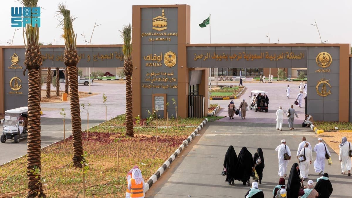 Iraqi pilgrims at the City of Pilgrims in Al-Jouf documenting their journey to Mecca.