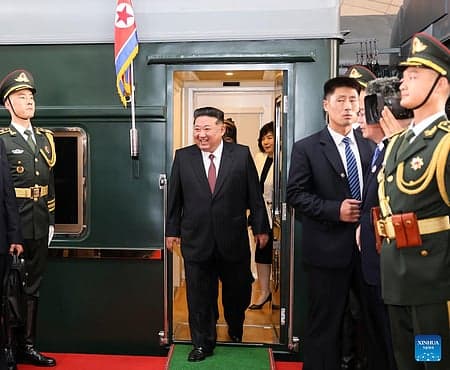North Korean warship with nuclear capabilities in the background.