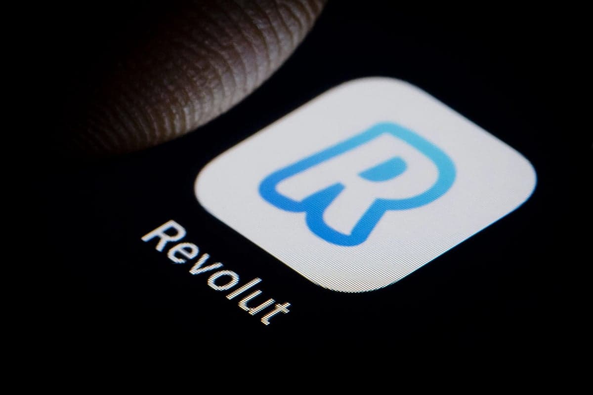 Revolut logo with a backdrop of UAE financial skyline