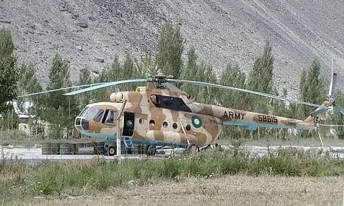 A Mi-17 helicopter in flight, symbolizing military aviation operations.