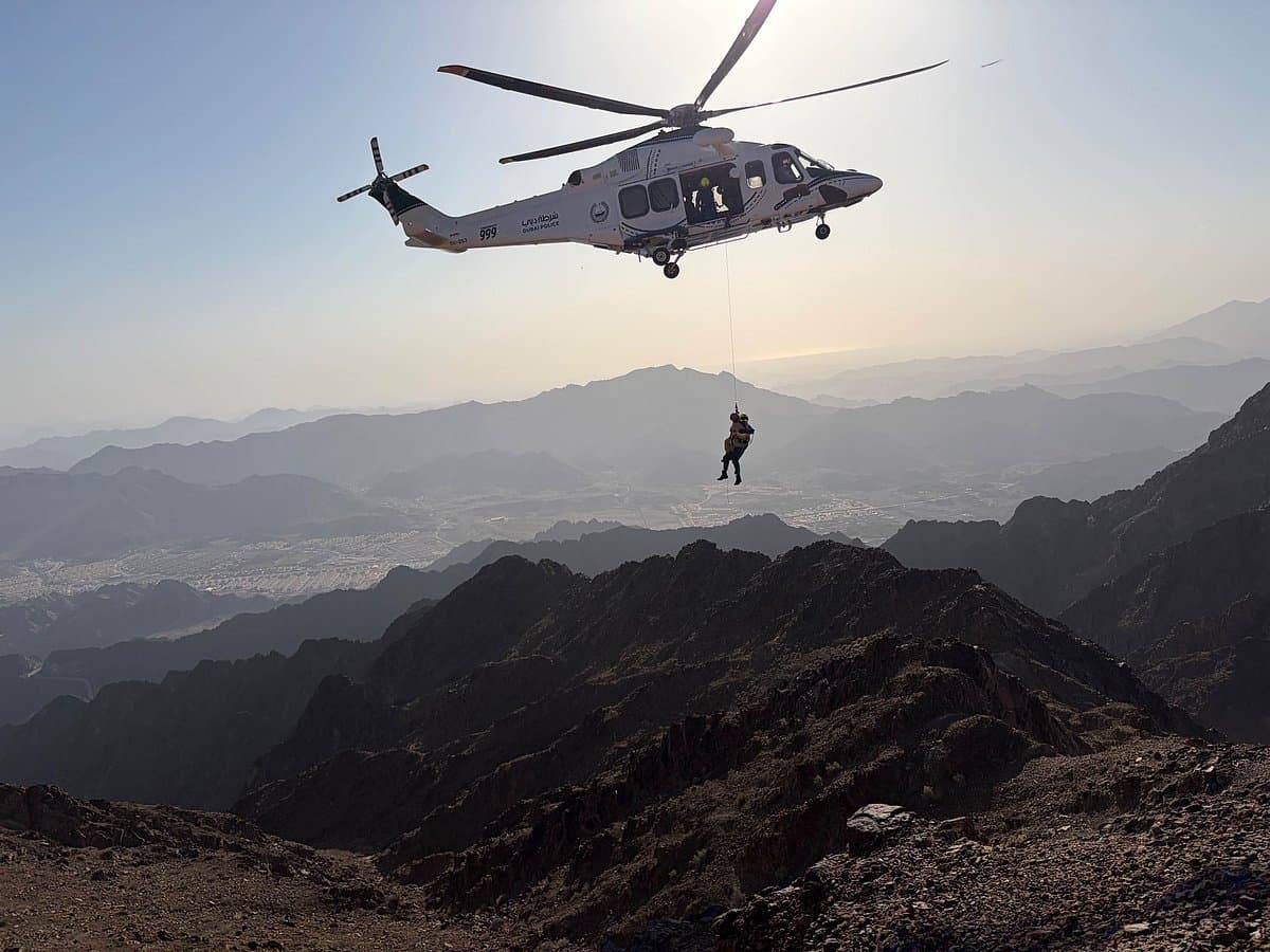 Dubai Police rescuing a hiker in the Hatta mountains after a two-day search.
