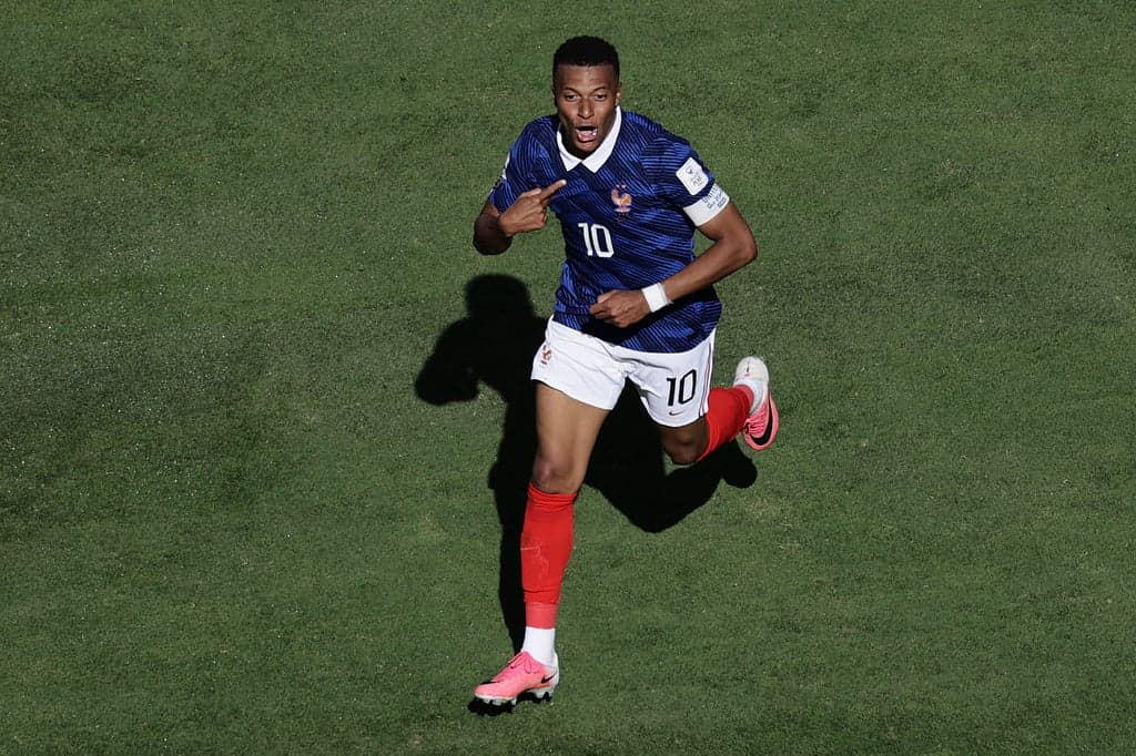Kylian Mbappé celebrating after scoring in the World Cup 2026 opener against Senegal.
