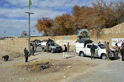 Police officers at a security checkpoint in Balochistan after a militant attack.