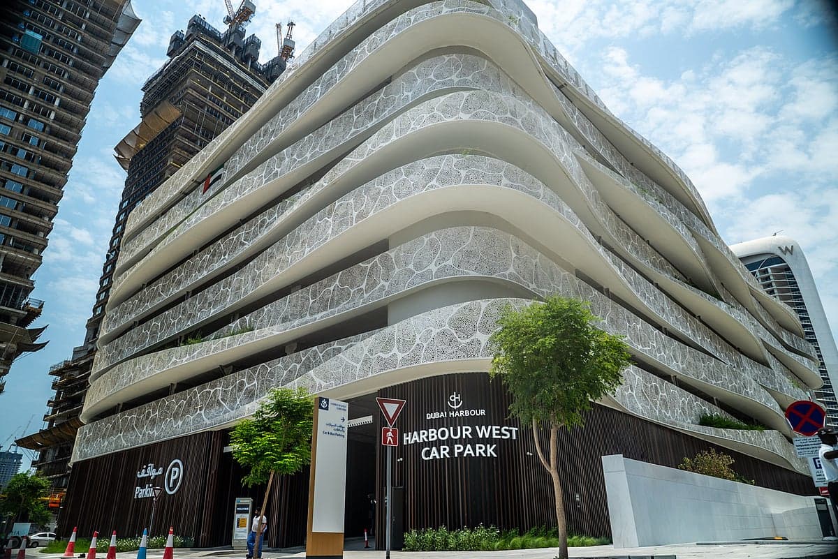 A modern parking facility at Dubai Harbour showcasing cashless payment technology.