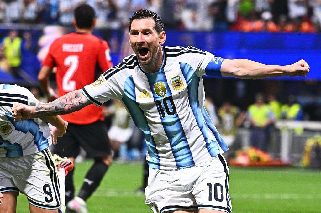 England and Argentina flags with a football in the background