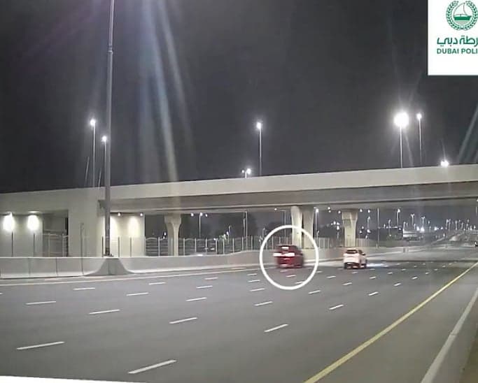 Dubai Police vehicle monitoring traffic for safety enforcement