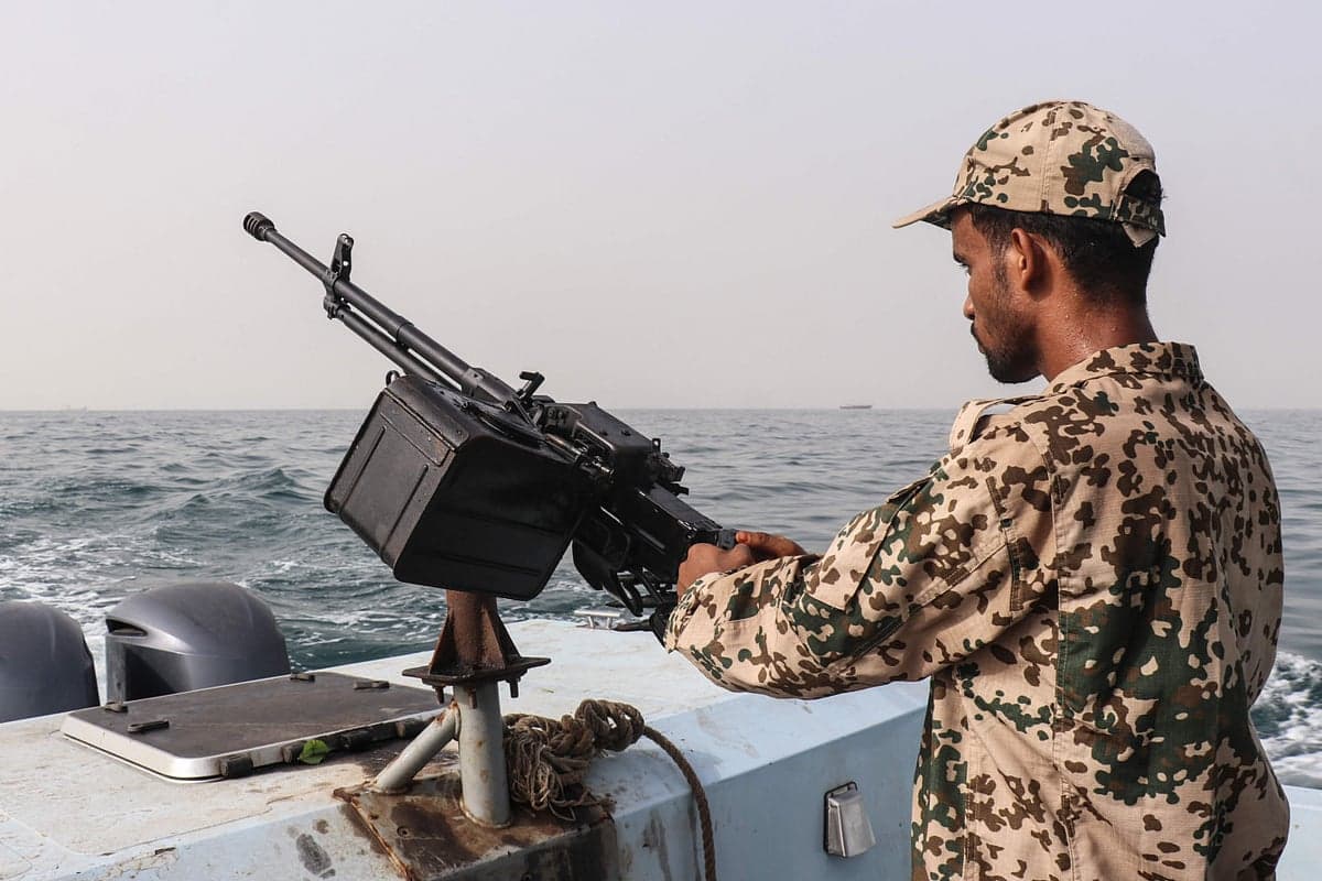 Houthi forces launching an attack on a Saudi refinery