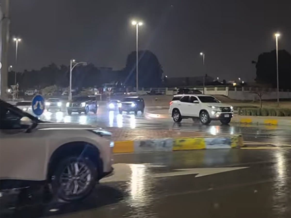 Stormy weather over Abu Dhabi parks and beaches, highlighting the recent closures due to thunderstorms.