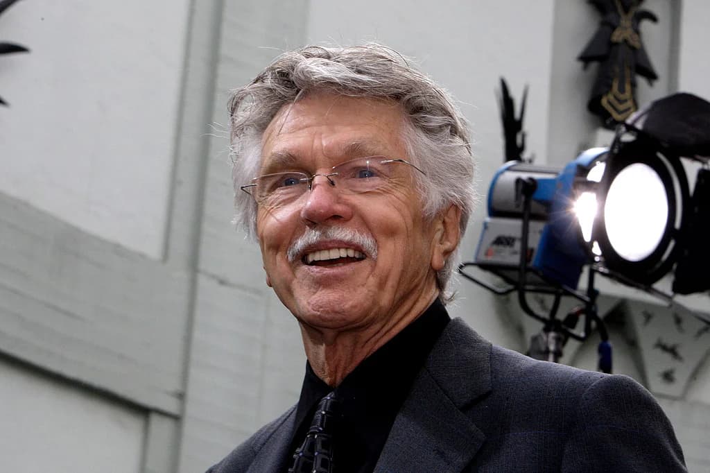 Tom Skerritt in a classic pose from Top Gun, representing his legacy in film.