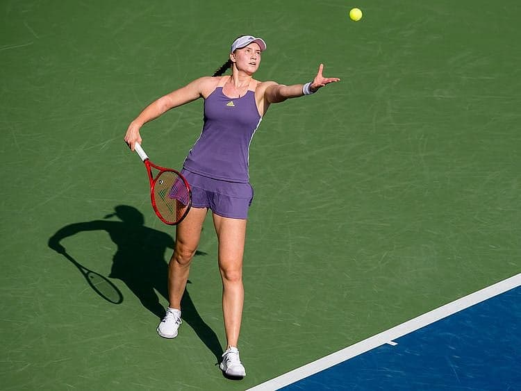 Elena Rybakina during a match, showing concern for her left ankle injury at the Cincinnati Open.