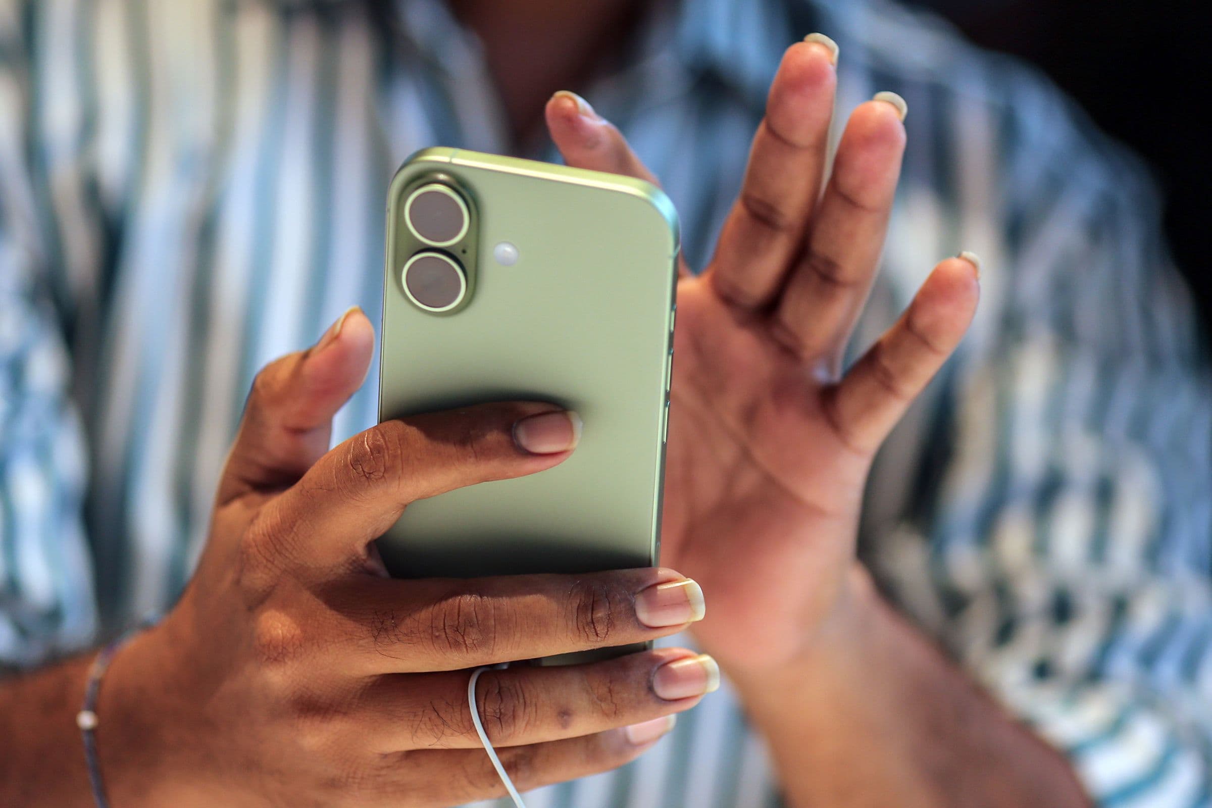 Apple iOS 26.5 update featuring encrypted RCS messaging and Maps improvements.