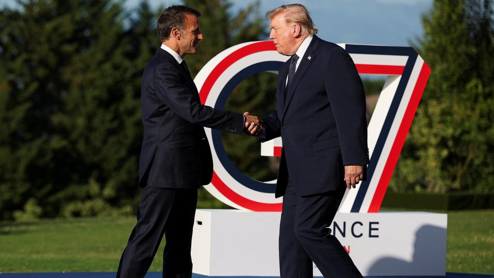 G7 leaders discussing technology and AI regulation at the summit in Evian.
