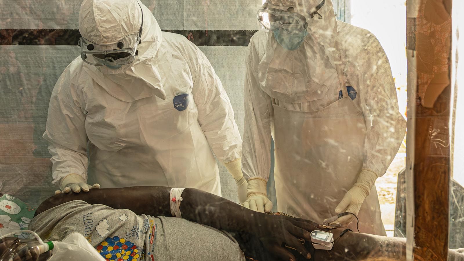 A healthcare professional administering treatment in a clinical trial for Ebola in the Democratic Republic of Congo.