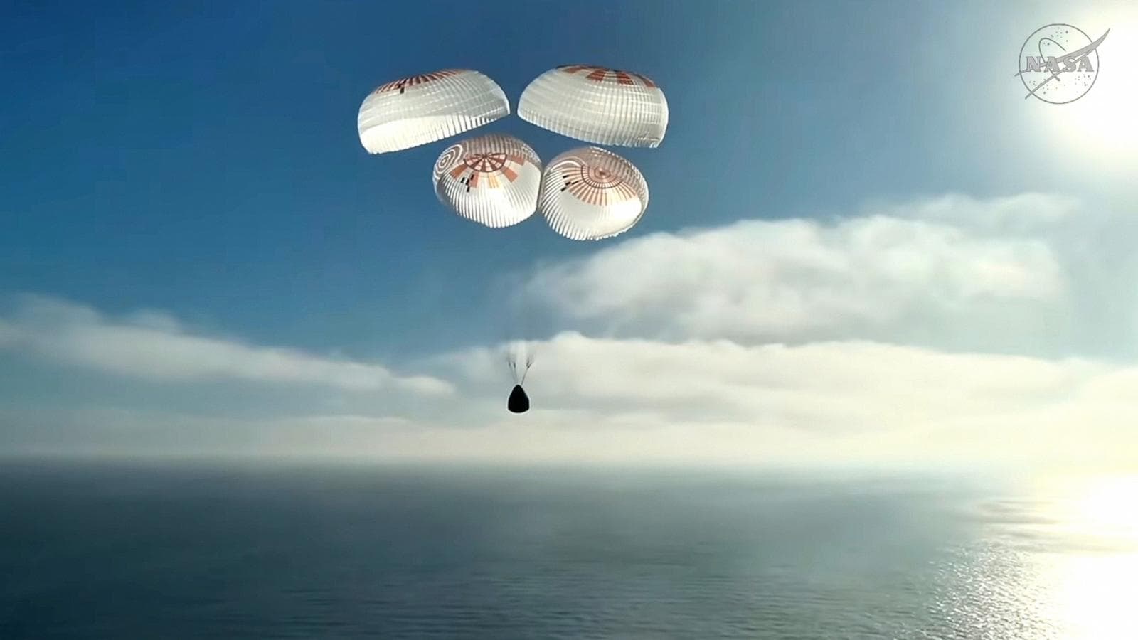 Crew-12 astronauts splashdown in the Pacific Ocean after their ISS mission.