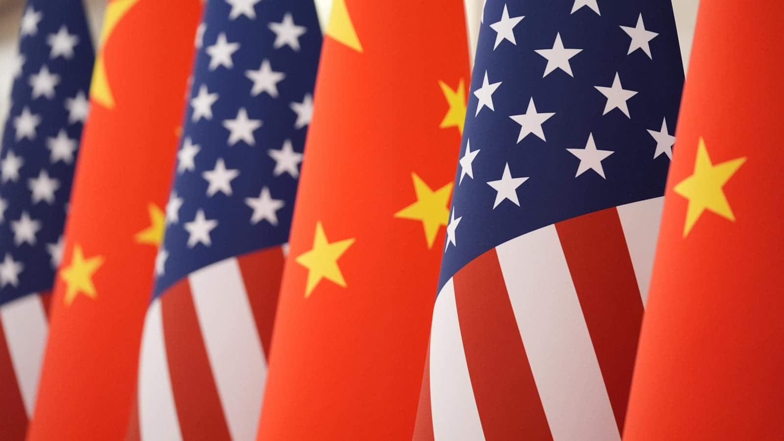 Illustration of trade tensions between China and the US with defense firms impacted.