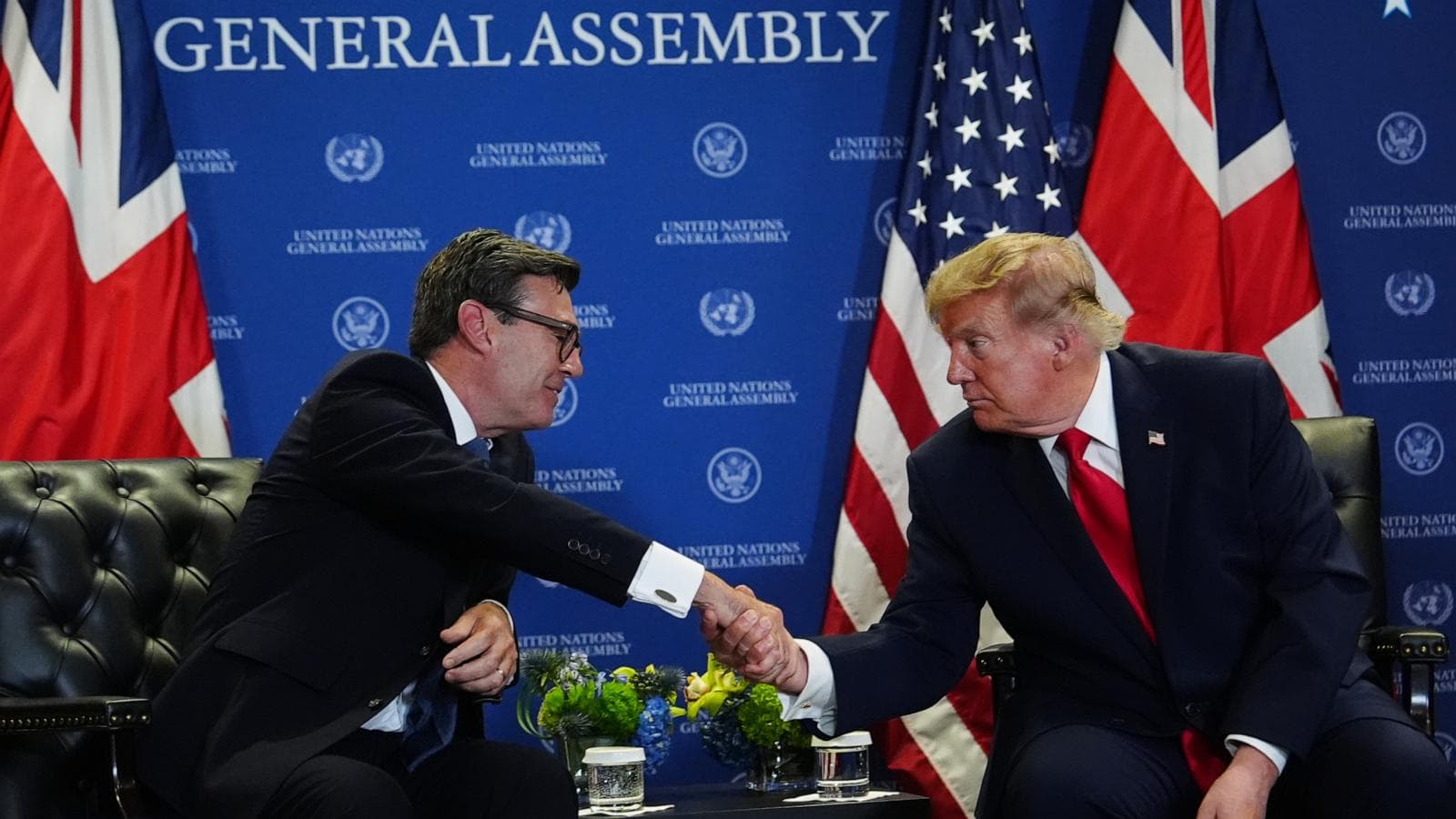 British PM Andy Burnham and US President Donald Trump at the UN discussing global AI standards and cooperation.