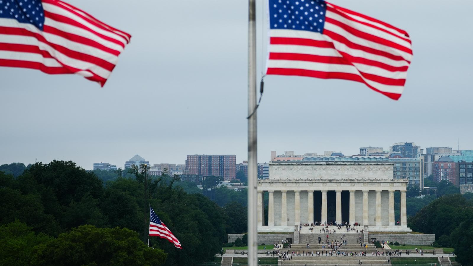US soldier memorial with flags and military honors
