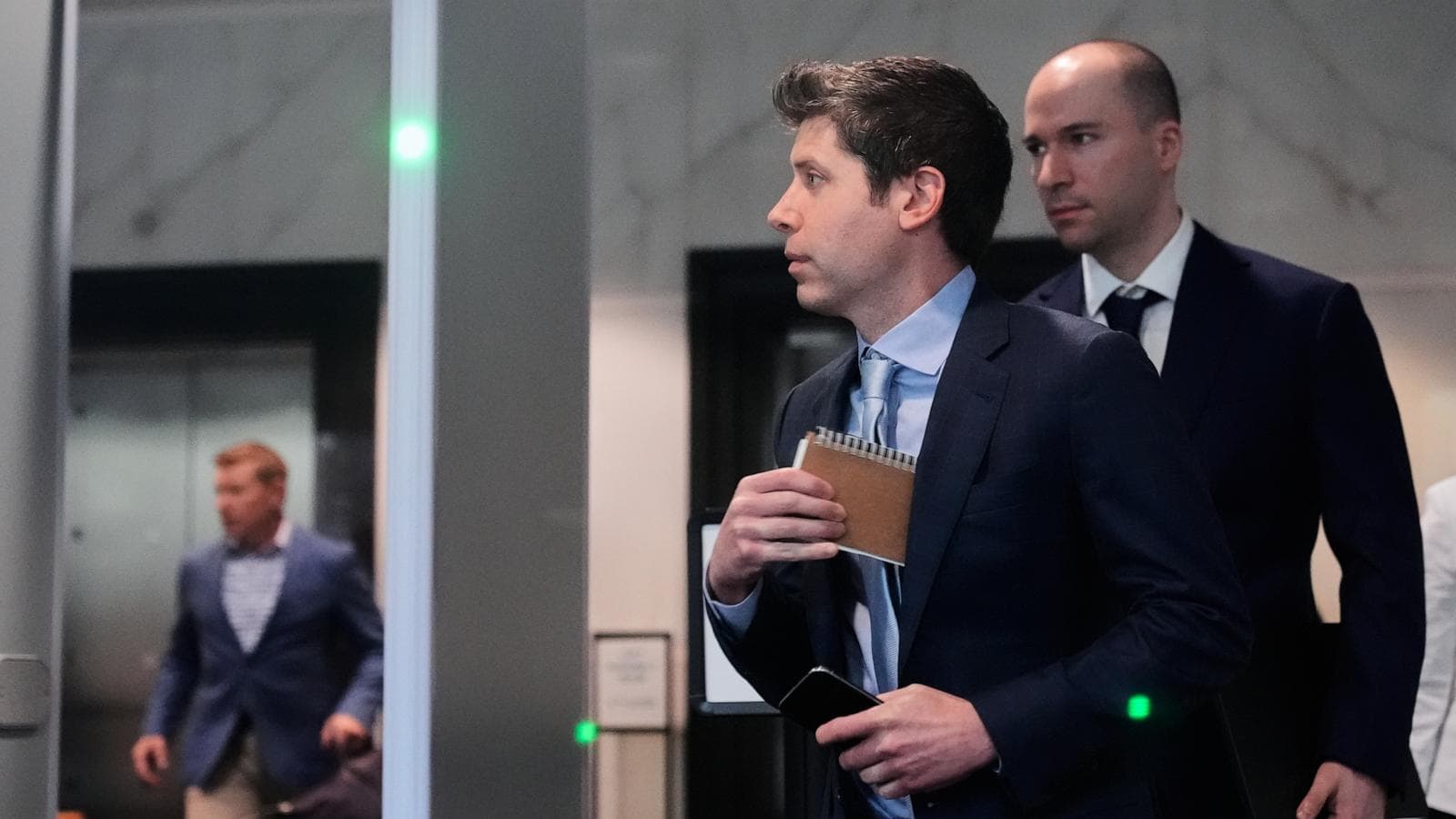 Elon Musk and Sam Altman in a courtroom setting discussing AI funding.