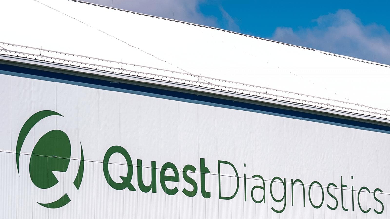 Infographic showing Quest Diagnostics cyber breach details and impact on patient data security.