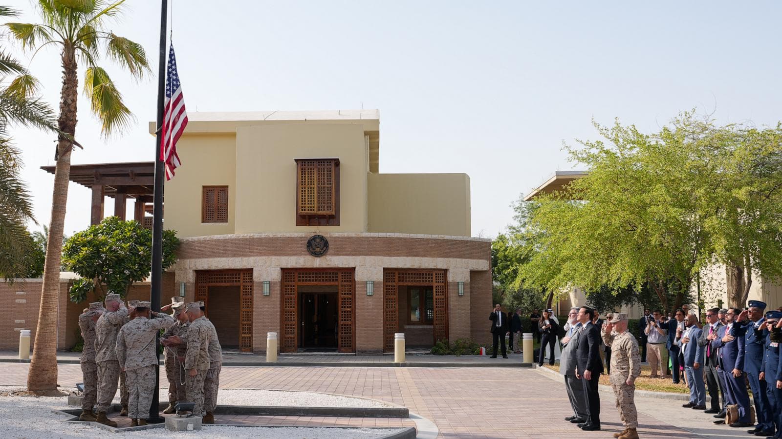 A visual timeline of US embassy staffing changes in the Middle East during the Iran conflict.