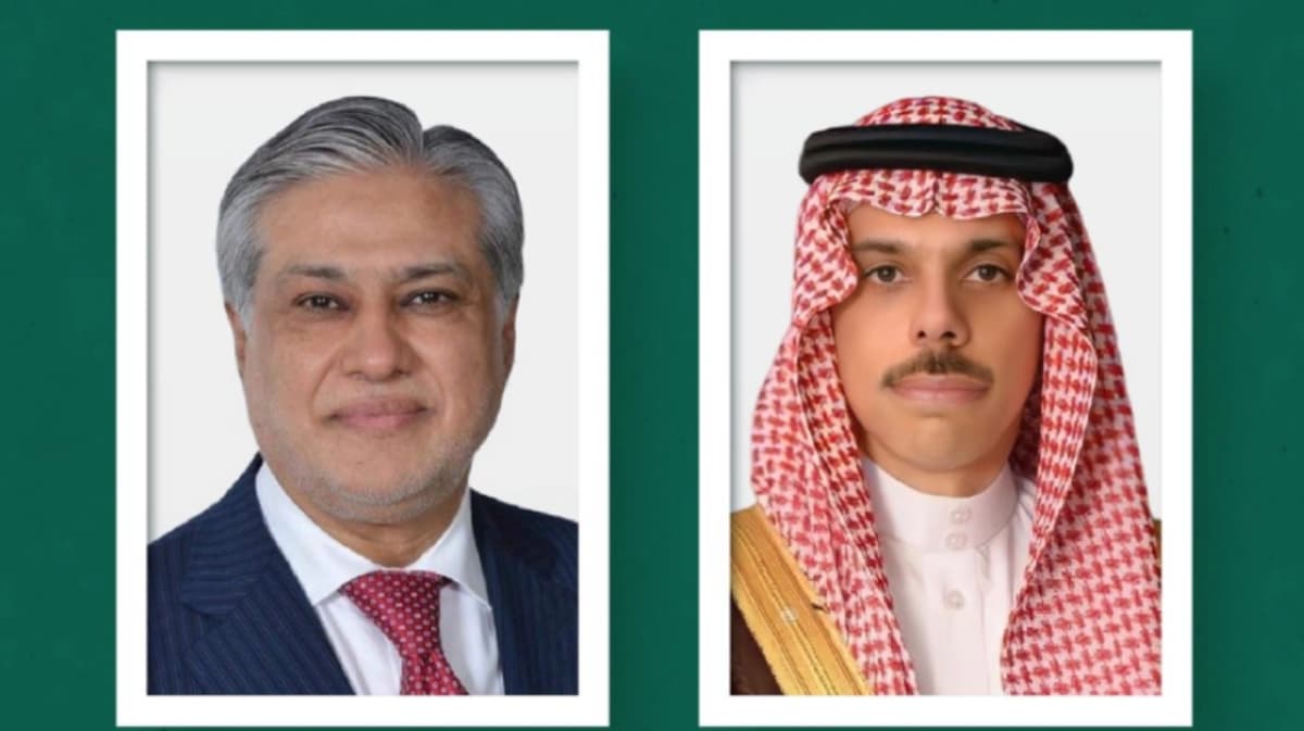 Saudi and Iranian foreign ministers discussing diplomatic negotiations.