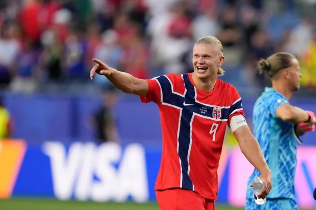 Erling Haaland celebrating his goals in Norway's World Cup match against Iraq.