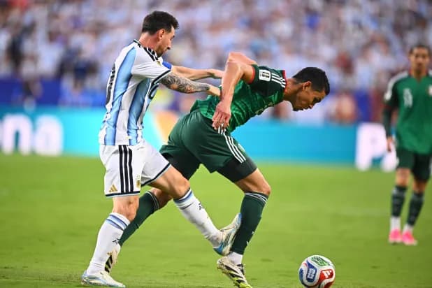 Messi celebrating his hat-trick during Argentina's 3-0 victory over Algeria in the World Cup opener.