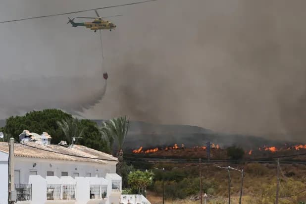 Firefighters battling a wildfire in Almería, Spain.