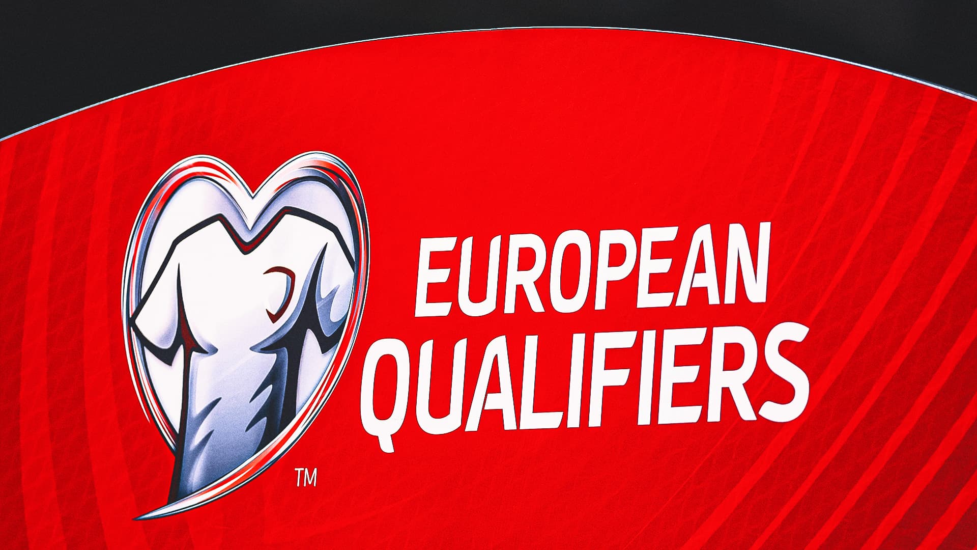 UEFA logo with a football background representing tournament reform