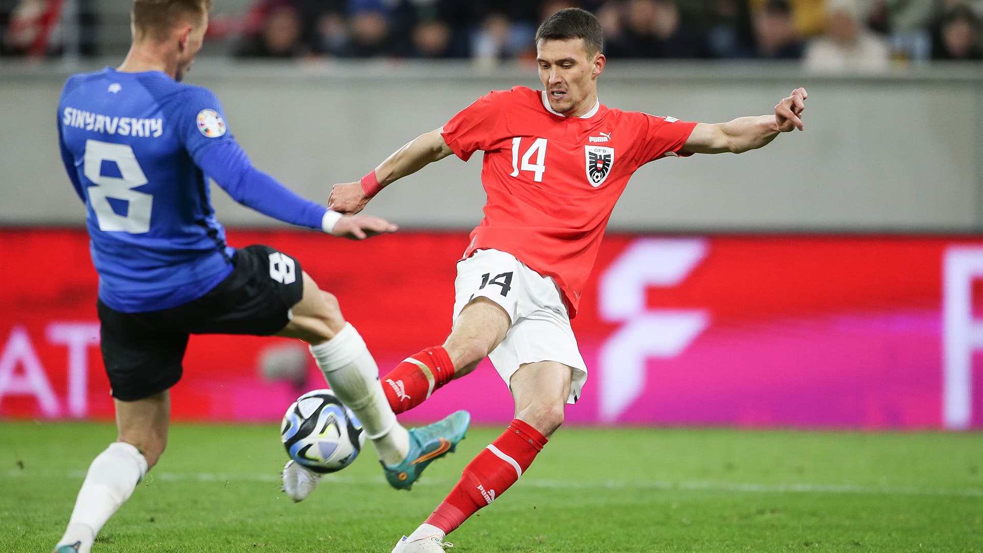 Dejan Ljubicic in action during a football match.