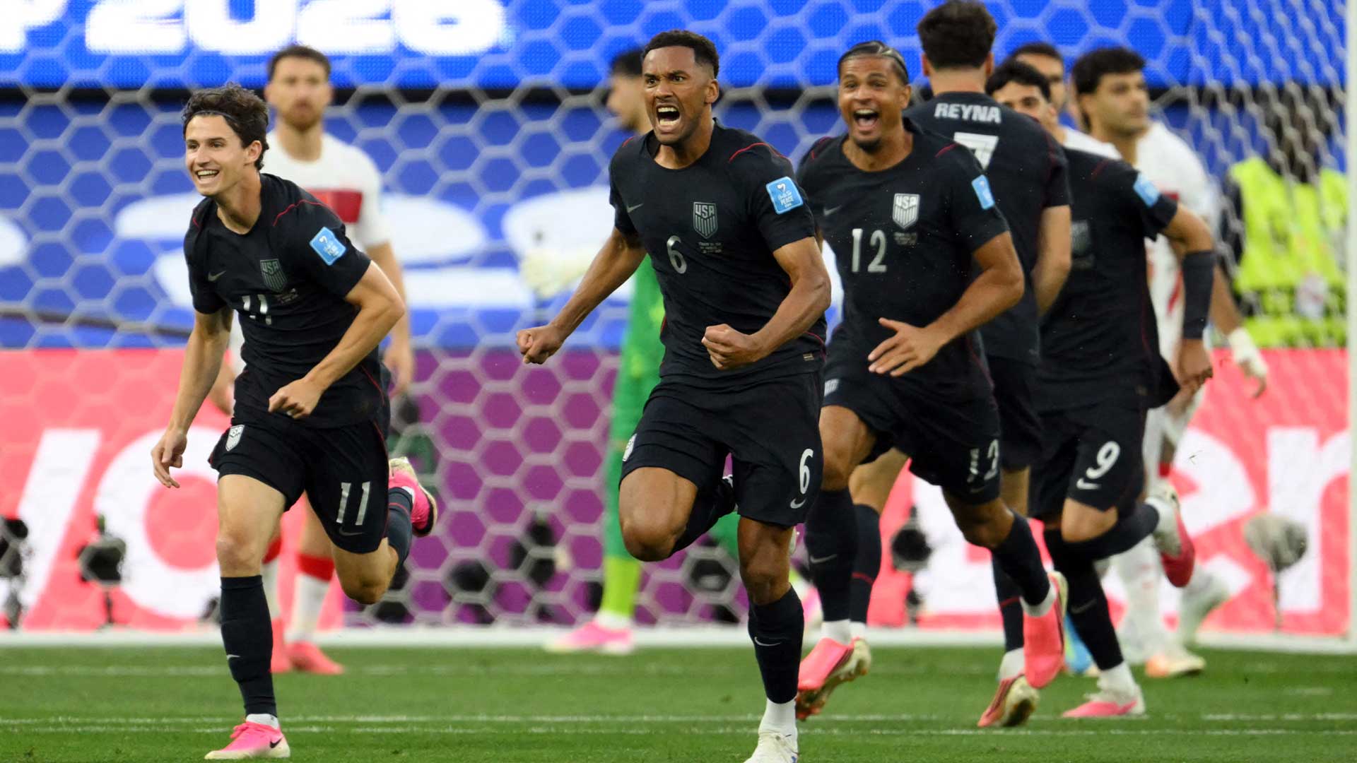 Fans celebrating at the 2026 World Cup matches