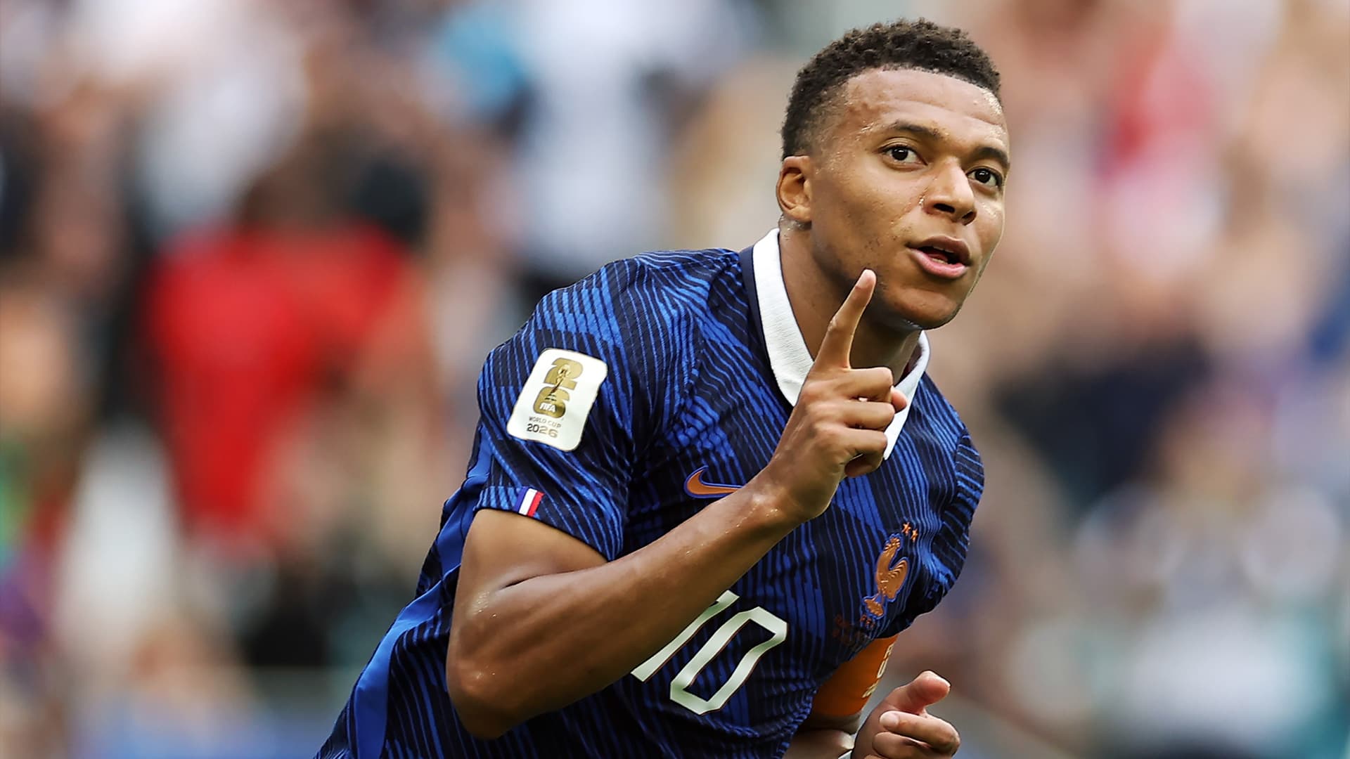 Kylian Mbappé celebrating after scoring in the World Cup bronze medal match.