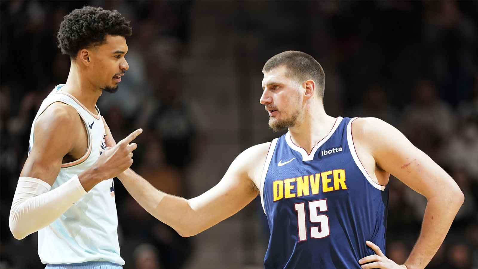 Nikola Jokic and Victor Wembanyama showcasing unique talent in basketball during a friendly match.